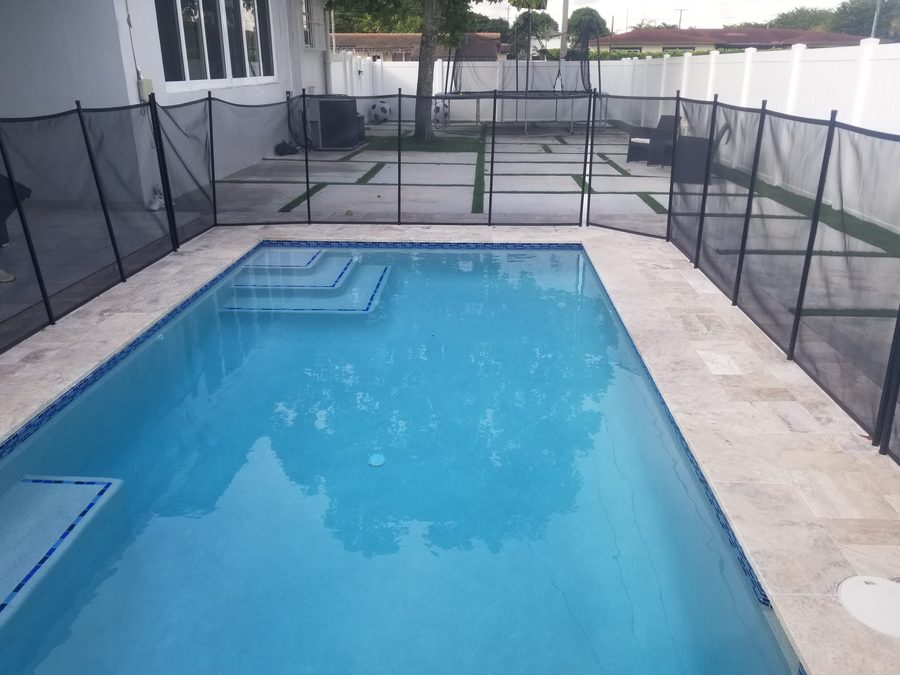 Modern white pool remodeled in South Florida